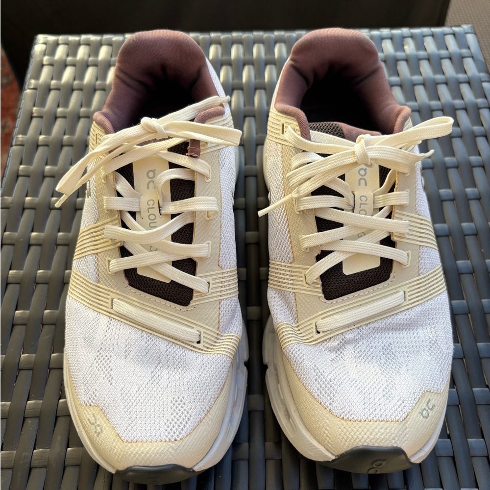 On Running Cream and White Athletic Shoes